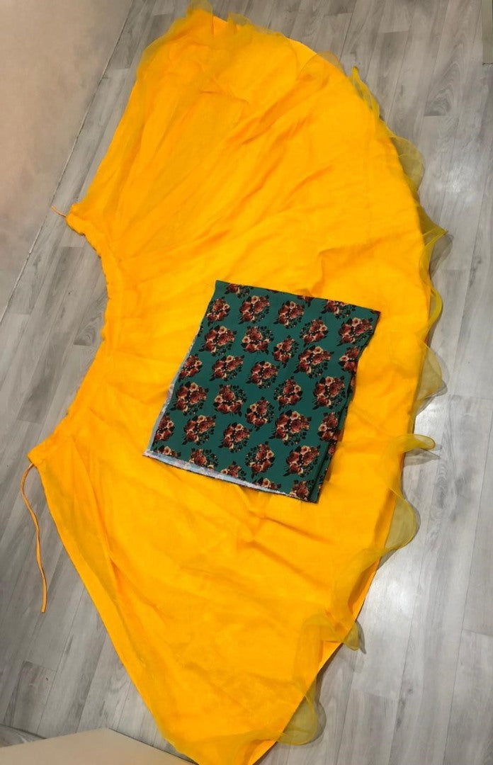 Yellow organza silk lehenga choli for haldi ceremony