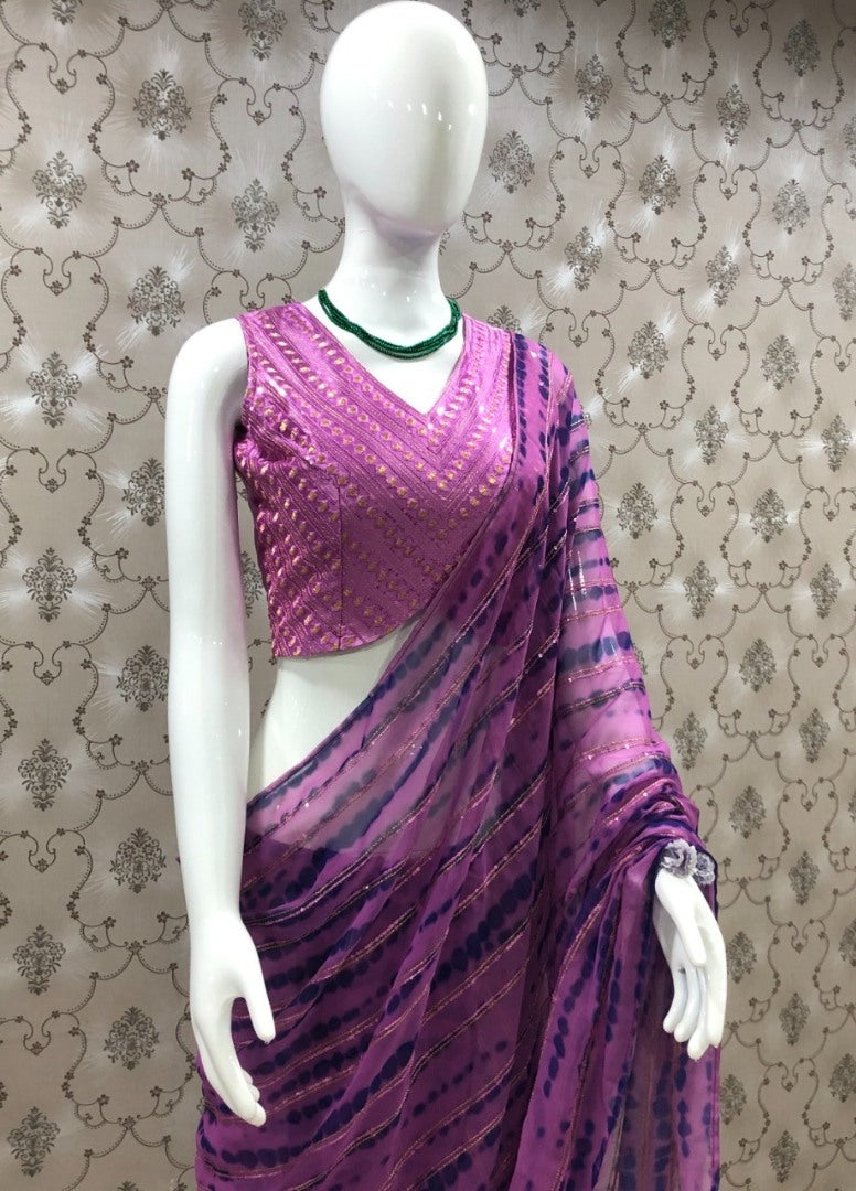 Baby pink georgette printed and embroidered saree