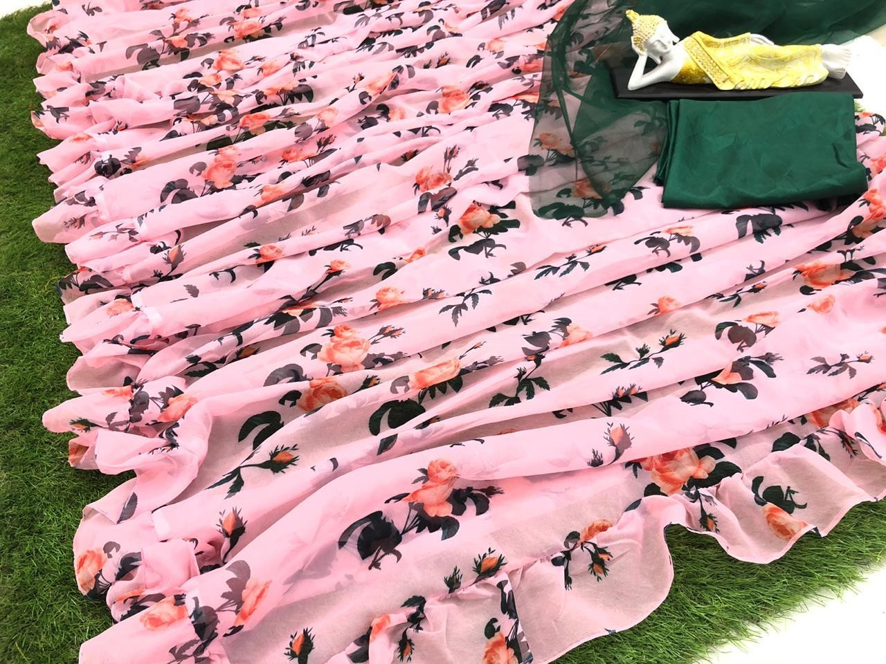 Baby pink georgette printed ruffle border saree