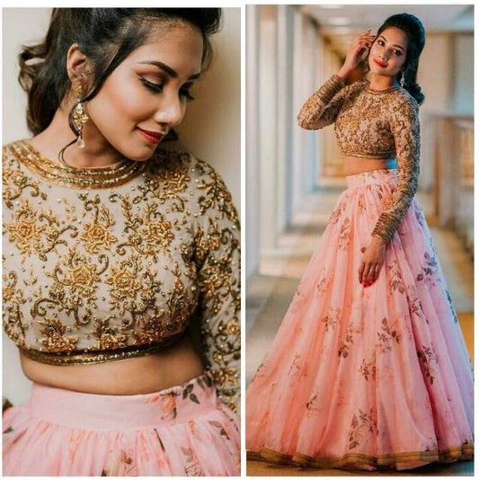 Baby pink organza printed lehenga with heavy work blouse