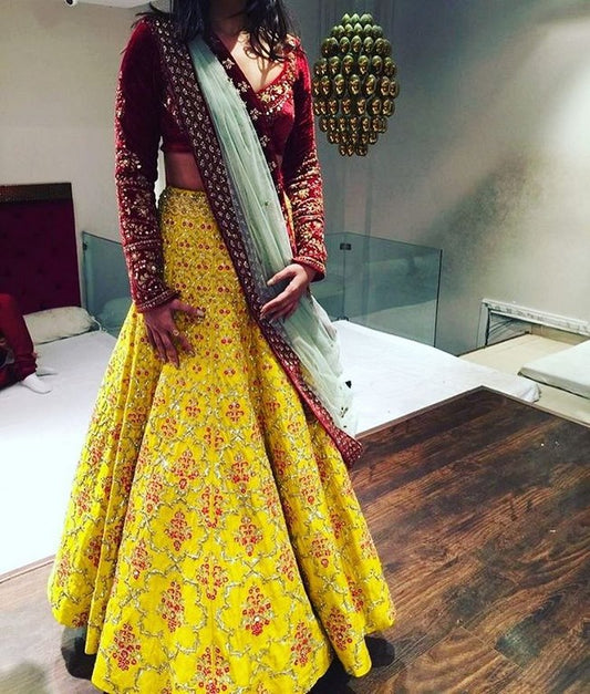 Beautiful designer heavy embroidered yellow lehenga