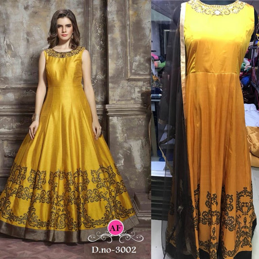 Beautiful hand worked yellow partywear heavy gown