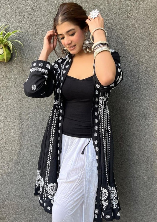 Black and white embroidery work dhoti suit with shrug