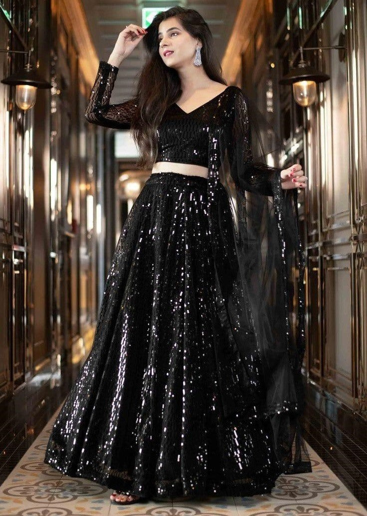 Black net heavy sequence worked ceremonial lehenga choli