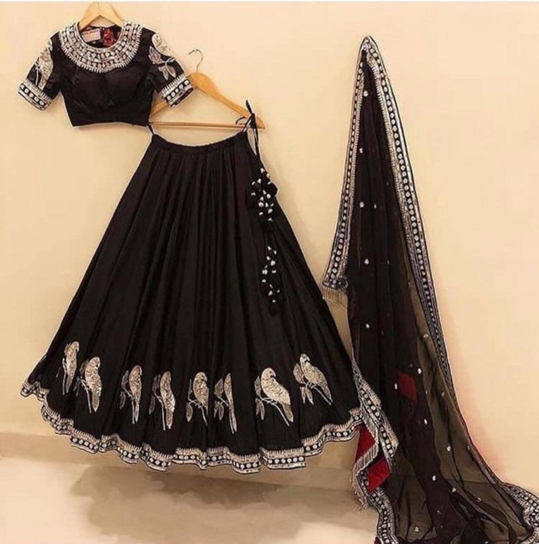 Black tapeta silk embroidered ceremonial lehenga