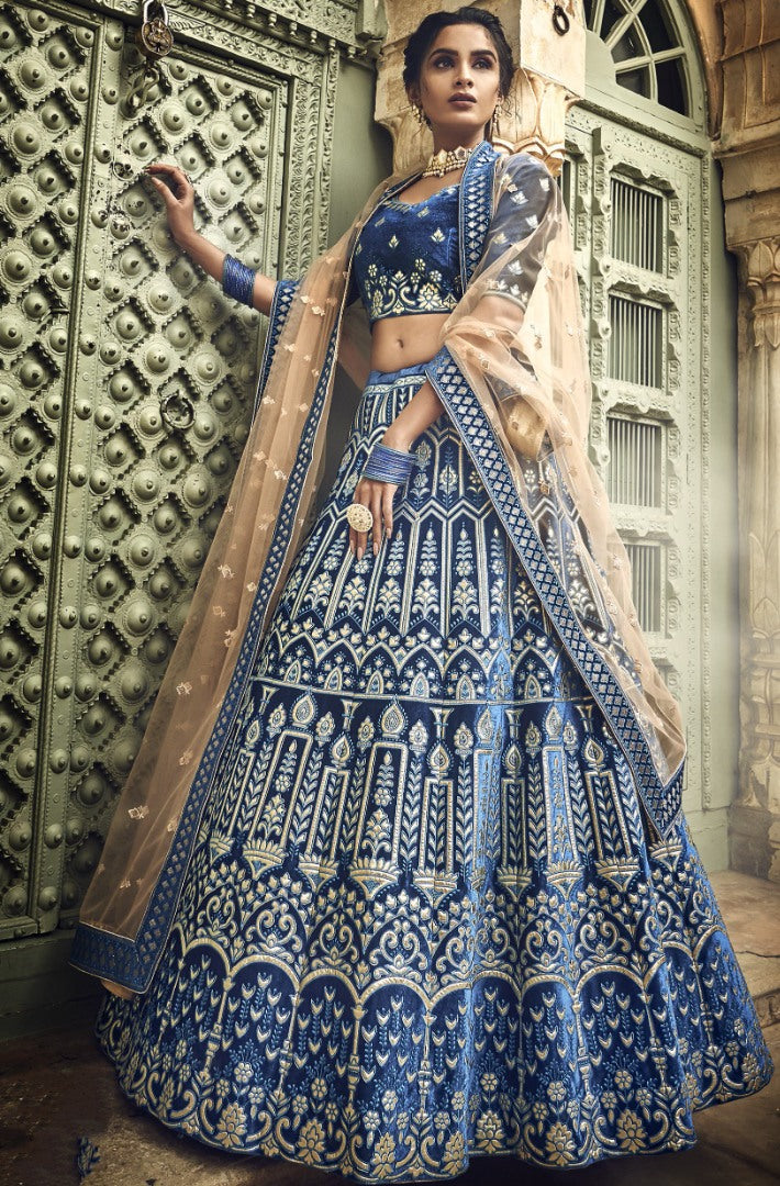 Blue velvet thread embroidered and zari work bridal lehenga choli