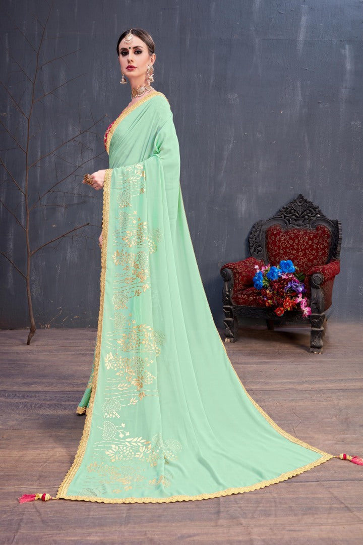 Designer mint green embroidered partywear saree