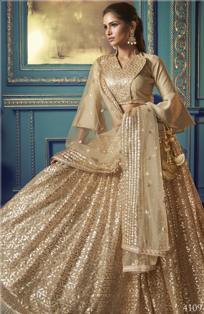 Dusty beige soft net sequence work bridal lehenga choli