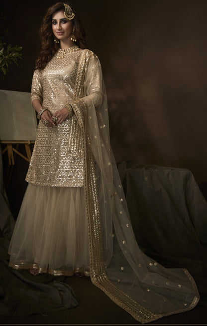 Dusty beige soft net sequence work ceremonial sharara salwar suit