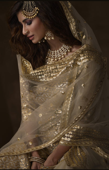 Dusty beige soft net sequence work ceremonial sharara salwar suit