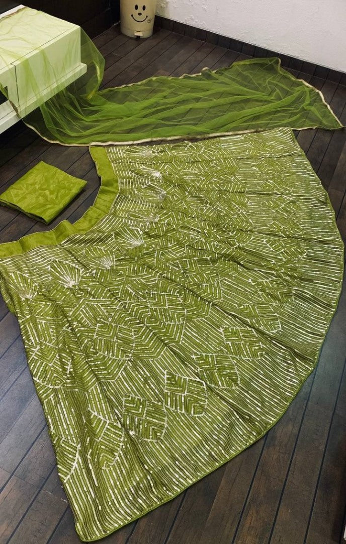 Green kasturi silk heavy sequence work lehenga choli for ceremony