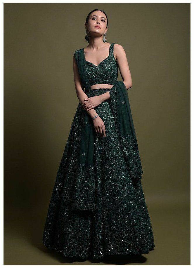 Green net heavy embroidery worked lehenga for wedding