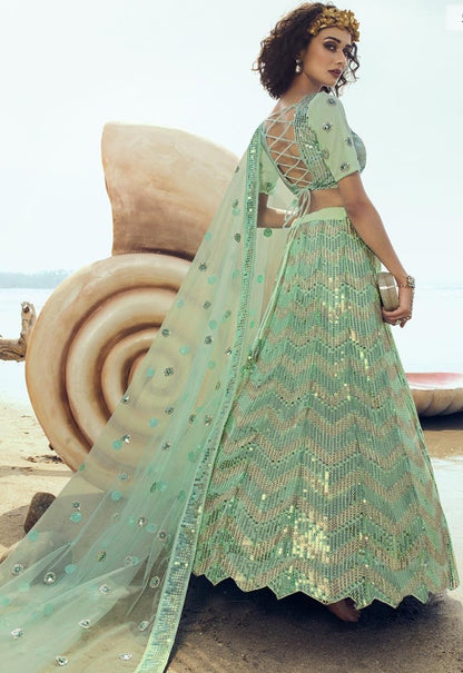 Green soft net sequence work ceremonial lehenga choli