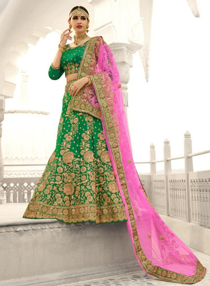 Green tapeta silk heavy embroidered bridal lehenga