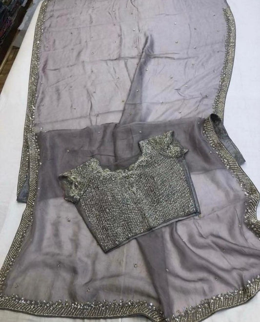 Grey rangoli silk sequence with stone work saree