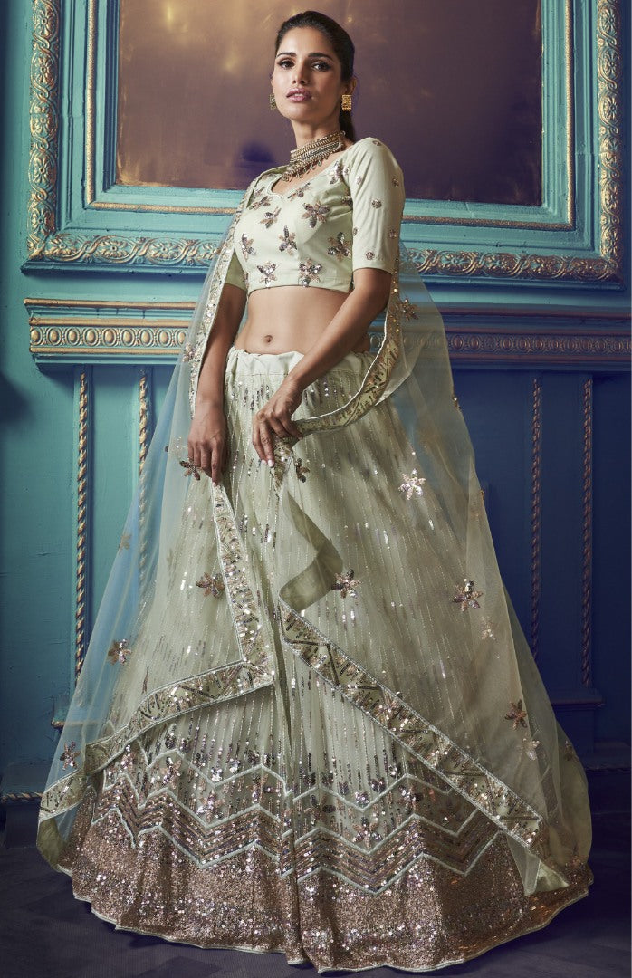 Light pista green soft net sequence work bridal lehenga choli