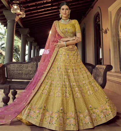 Mustard yellow organza resham and zari work bridal lehenga choli