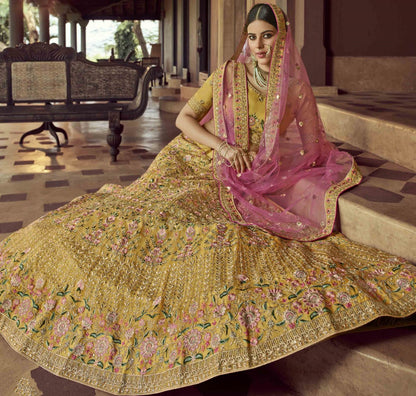 Mustard yellow organza resham and zari work bridal lehenga choli