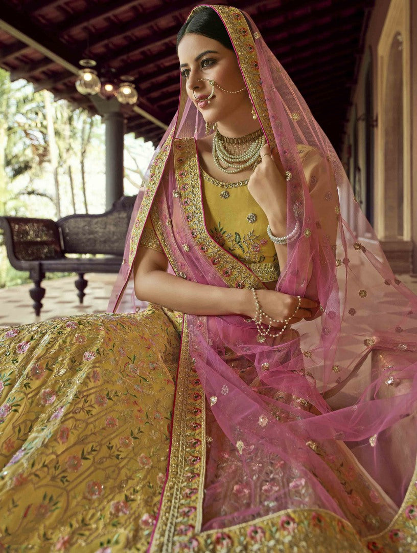 Mustard yellow organza resham and zari work bridal lehenga choli