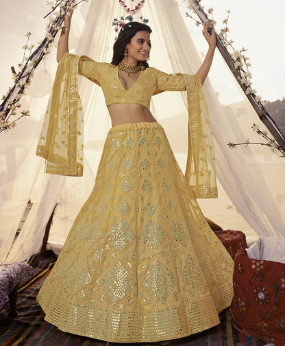 Mustard yellow organza thread, foil & mirror work bridal lehenga choli