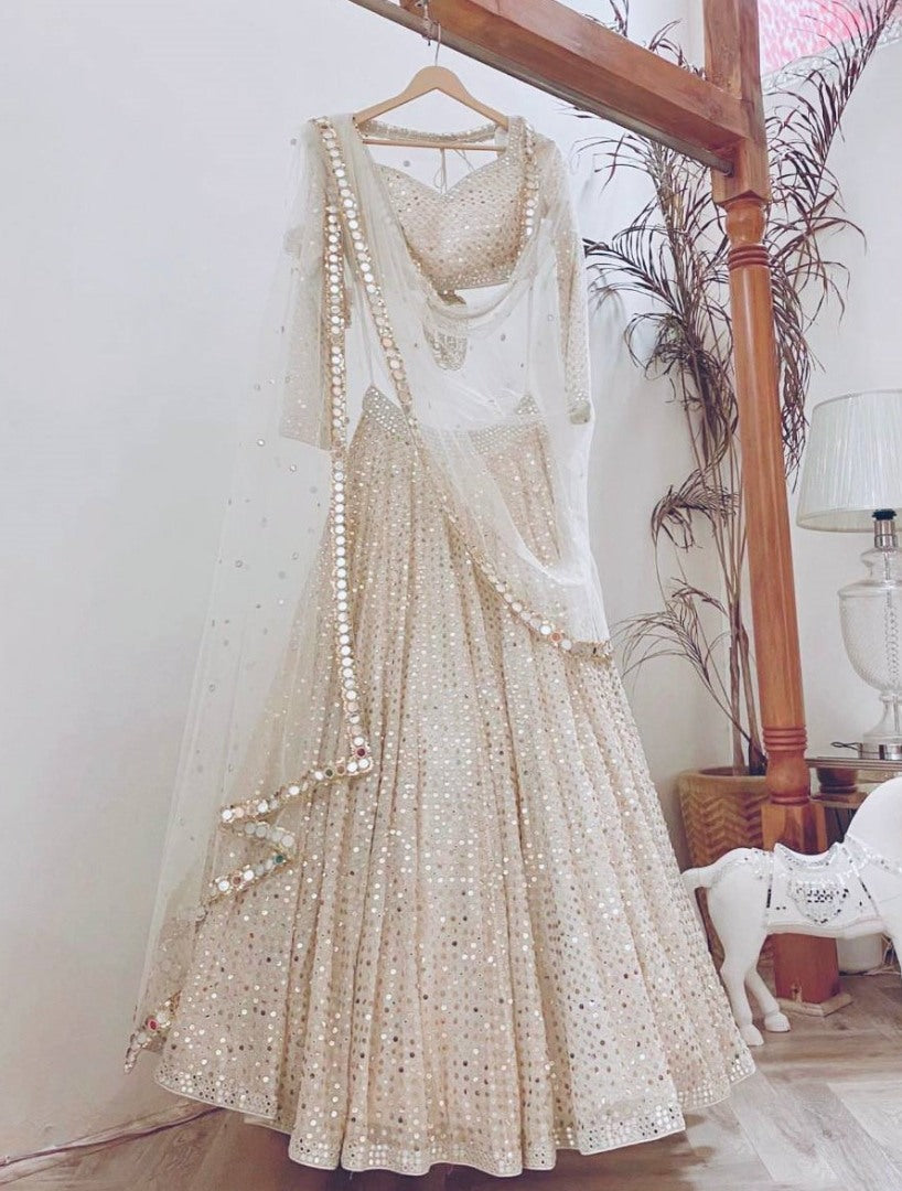 Off white georgette heavy sequence and thread work wedding lehenga choli