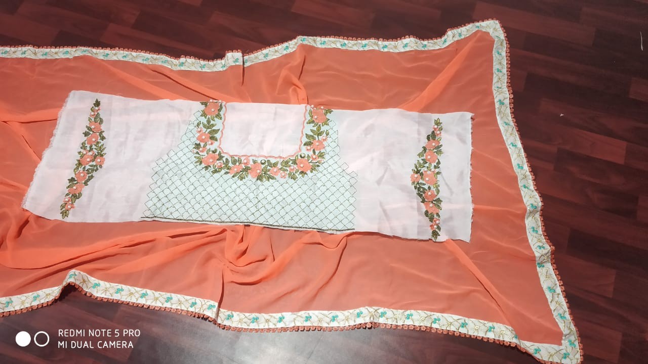 orange georgette saree with pearl work designer blouse.