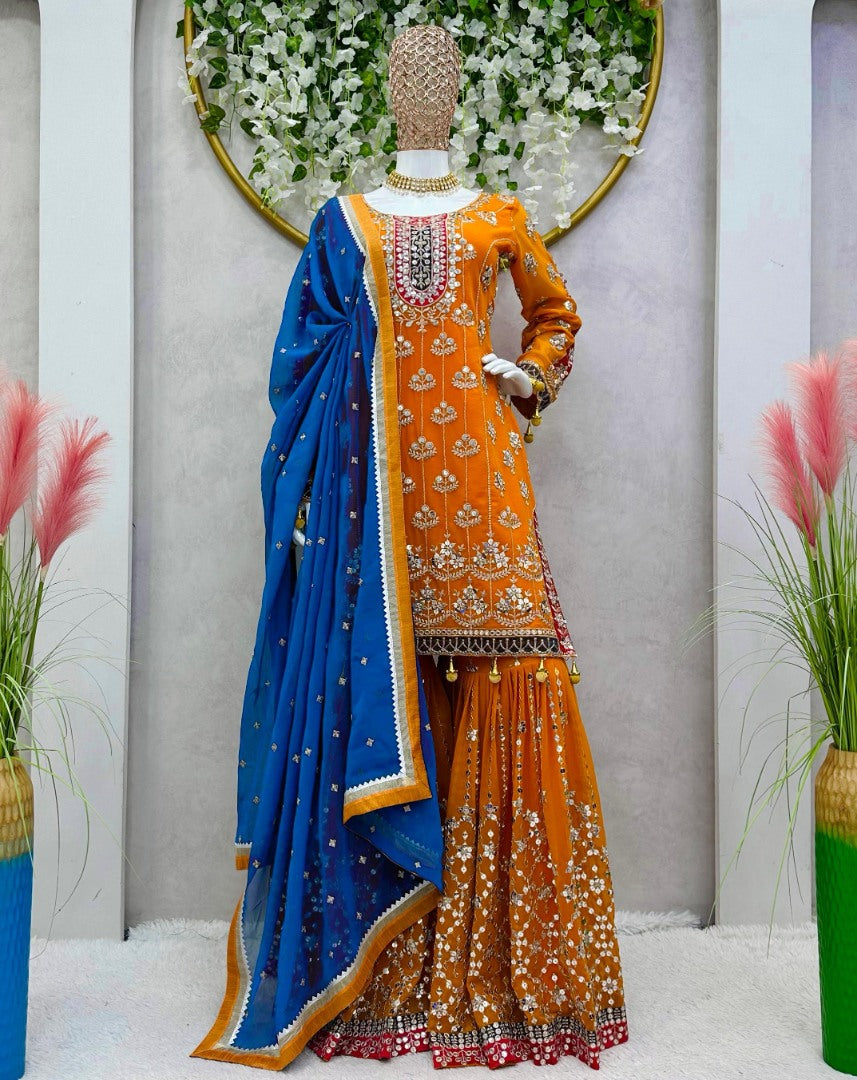 Orange heavy work designer wedding sharara suit