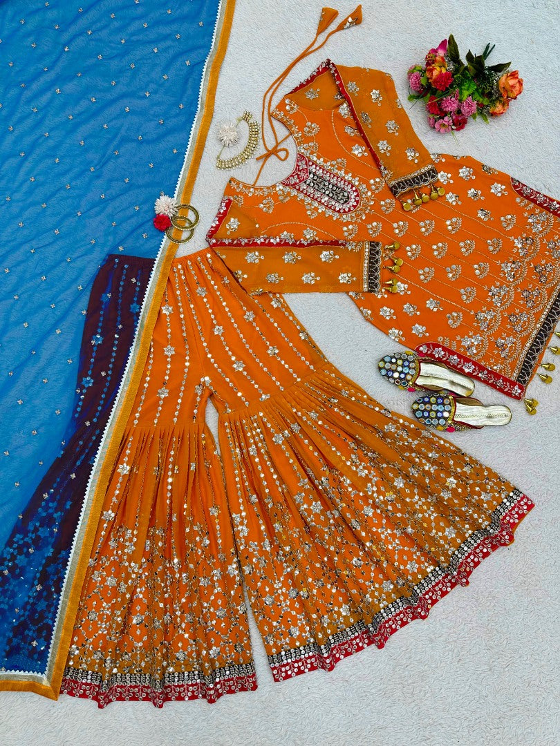 Orange heavy work designer wedding sharara suit