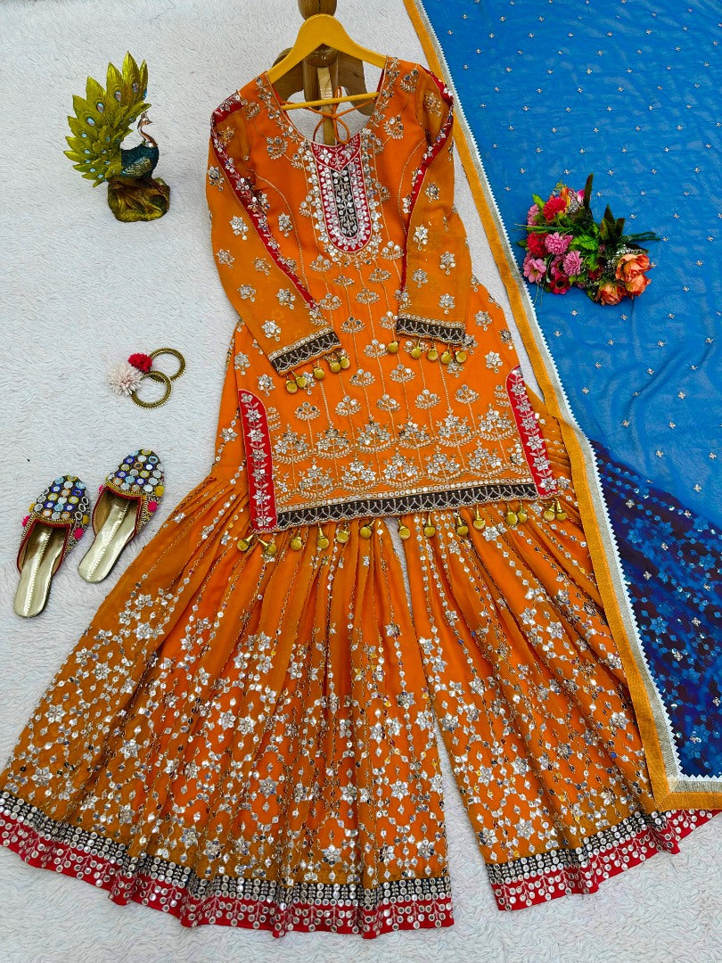 Orange heavy work designer wedding sharara suit