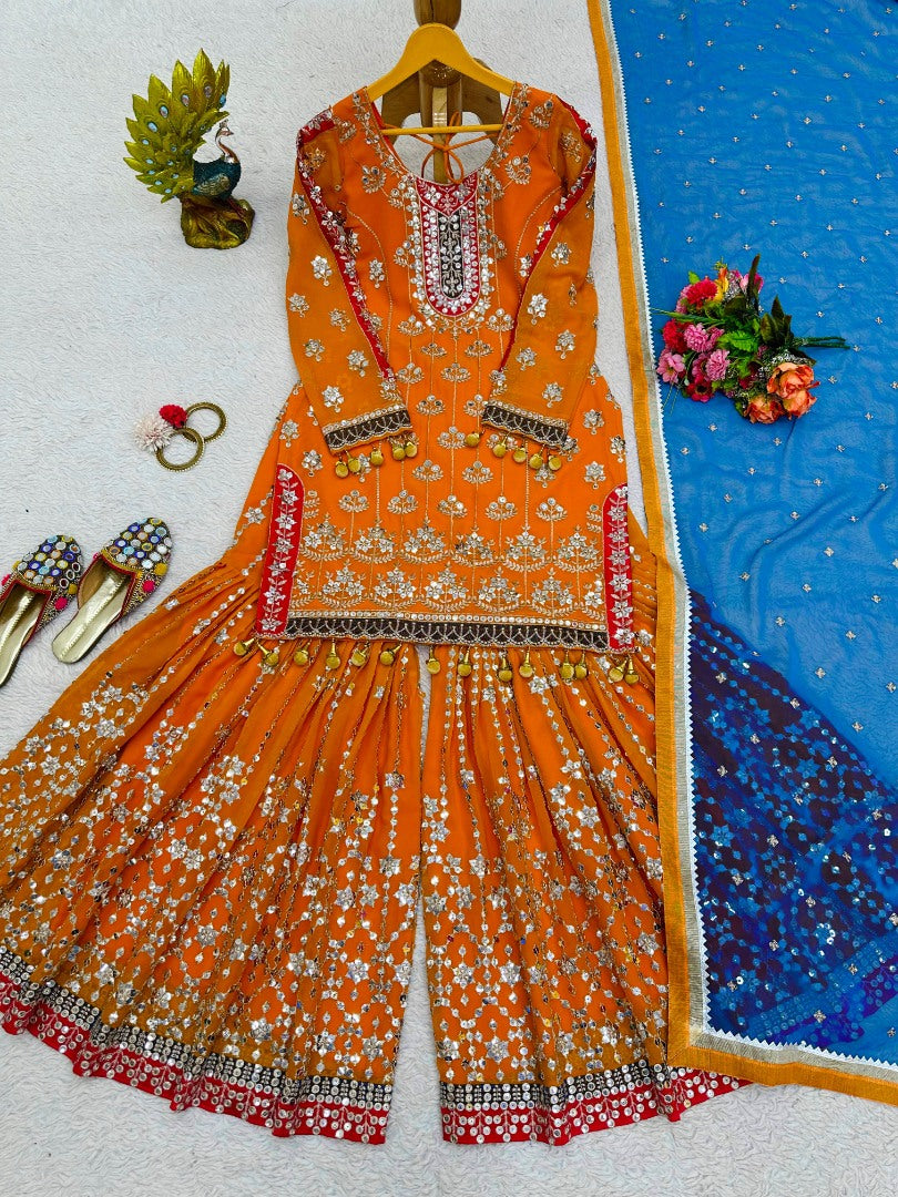 Orange heavy work designer wedding sharara suit