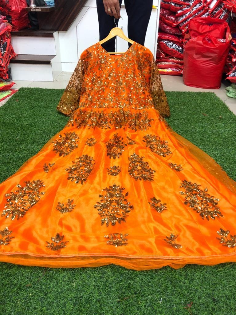 Orange net heavy sequence work wedding gown