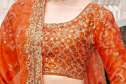 Orange organza heavy embroidered sequence work wedding lehenga choli