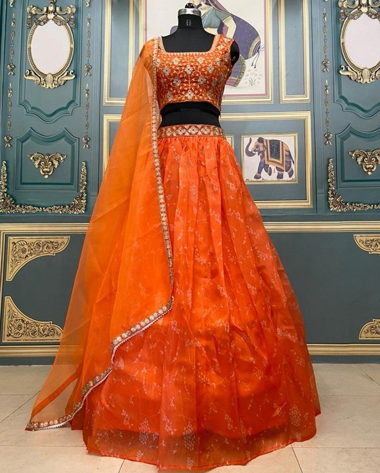 Orange organza printed and embroidered lehenga choli