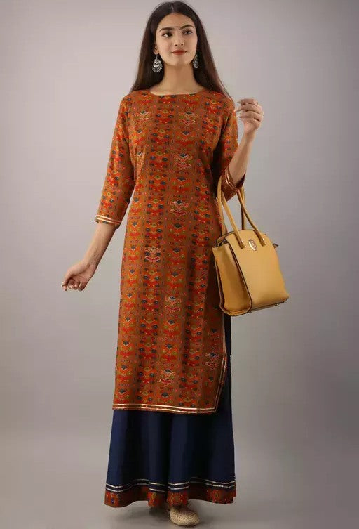 Orange rayon printed kurti with navy blue skirt