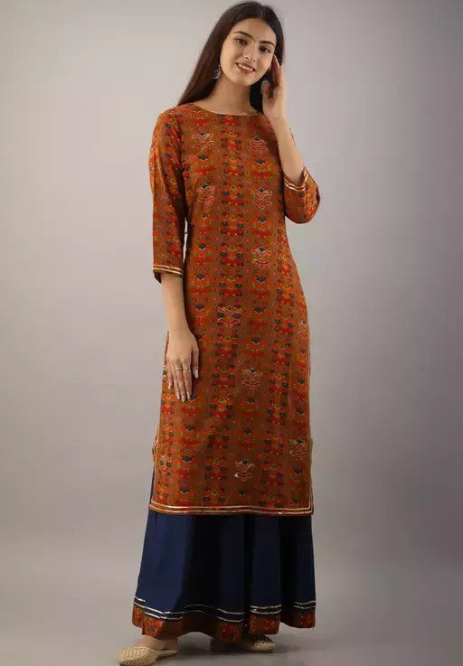 Orange rayon printed kurti with navy blue skirt