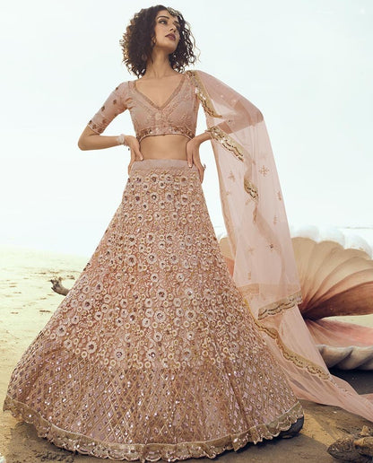 Peach soft net sequence thread work ceremonial lehenga choli