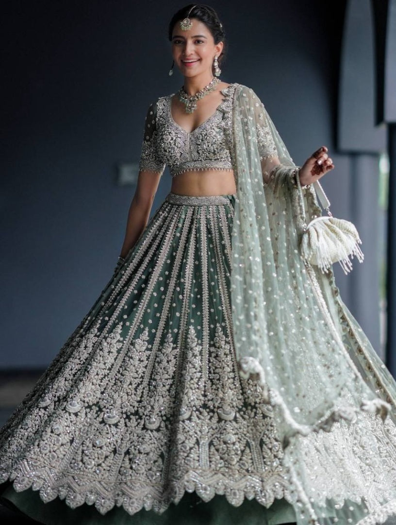 Pista green net heavy work wedding lehenga choli