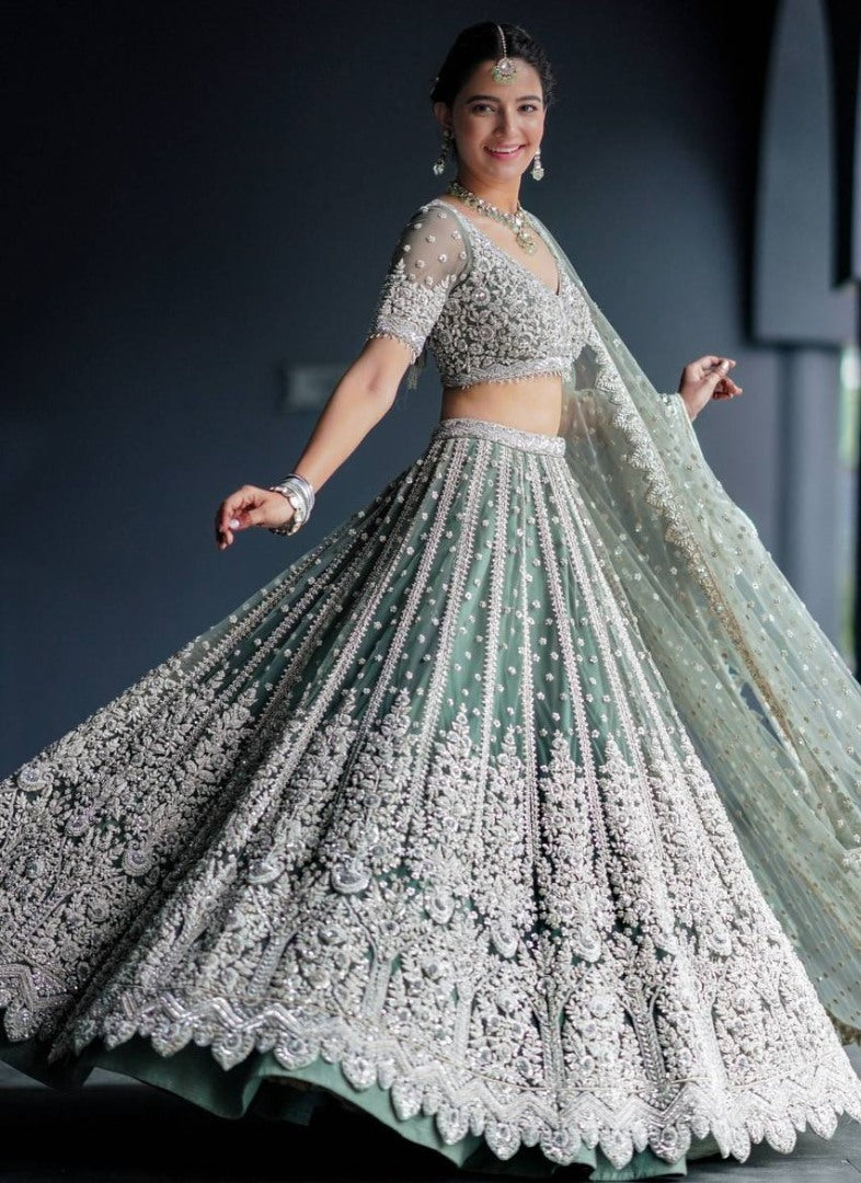 Pista green net heavy work wedding lehenga choli