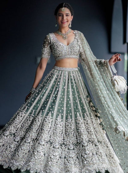 Pista green net heavy work wedding lehenga choli