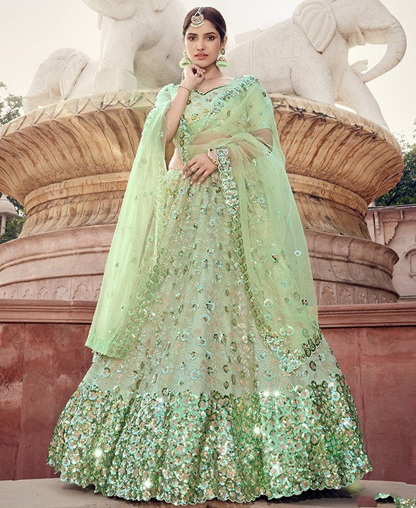 Pista green soft net sequence work bridal lehenga choli