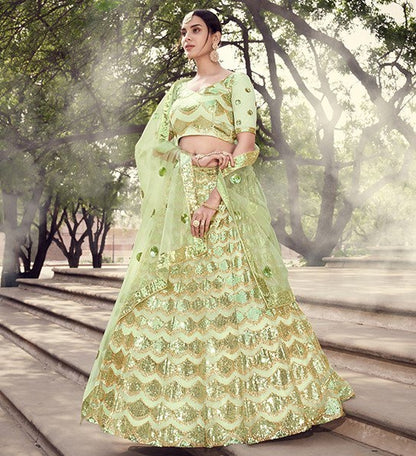 Pista green soft net sequence work bridal lehenga choli