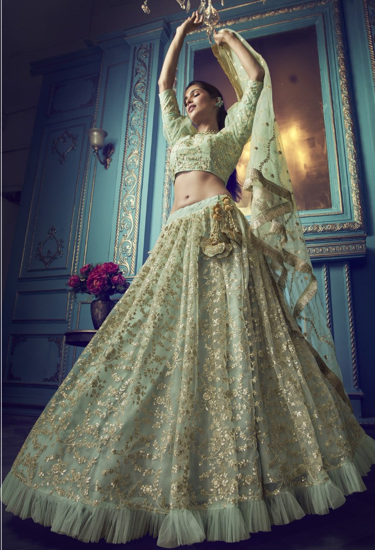 Pista green soft net sequence work bridal lehenga choli