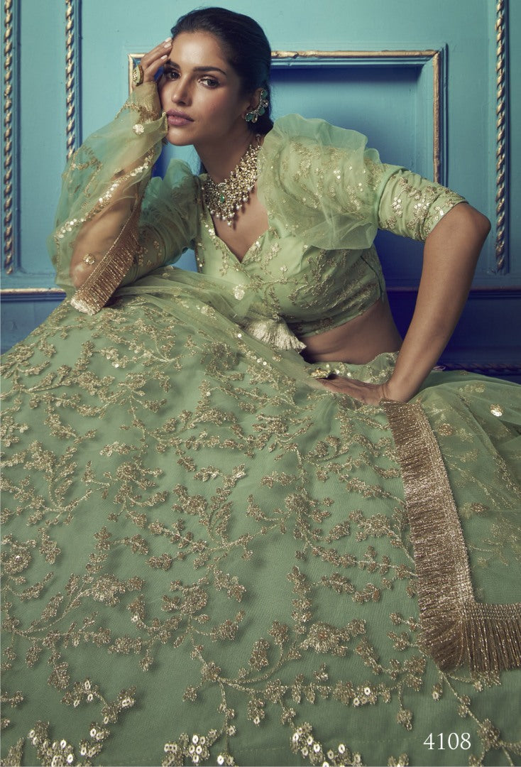 Pista green soft net sequence work bridal lehenga choli