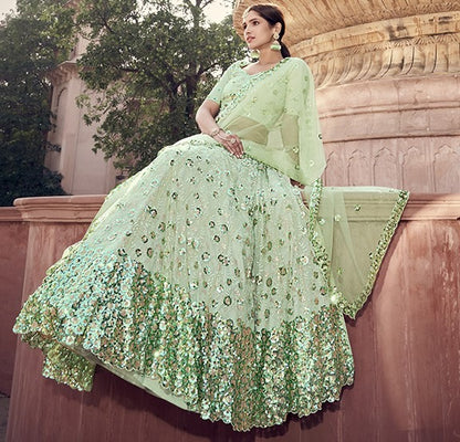 Pista green soft net sequence work bridal lehenga choli