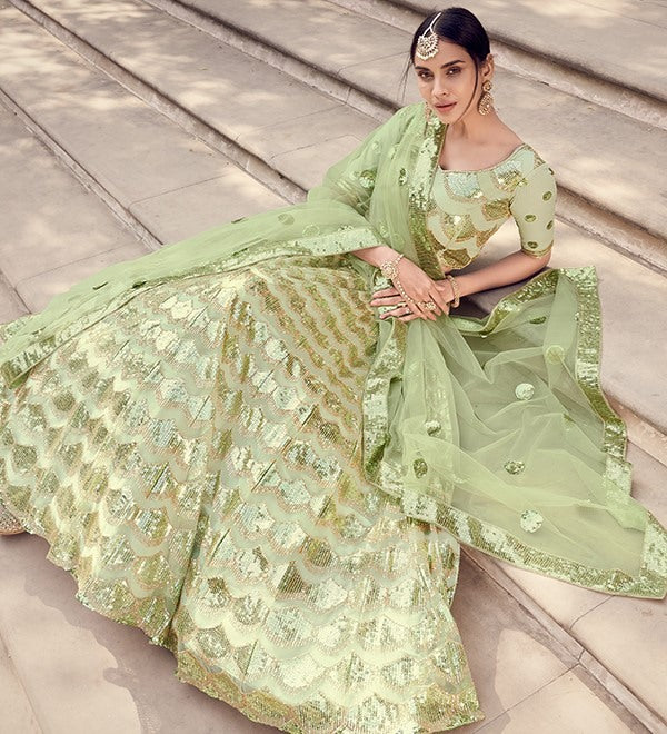 Pista green soft net sequence work bridal lehenga choli