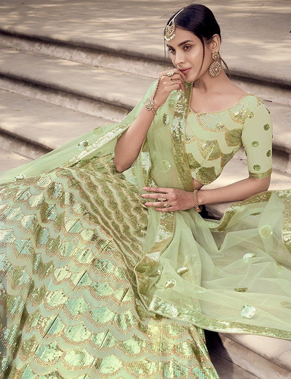 Pista green soft net sequence work bridal lehenga choli