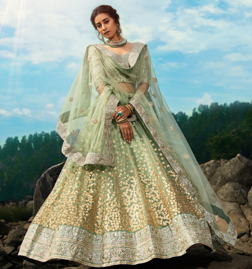 Pista green soft net sequence work bridal lehenga choli