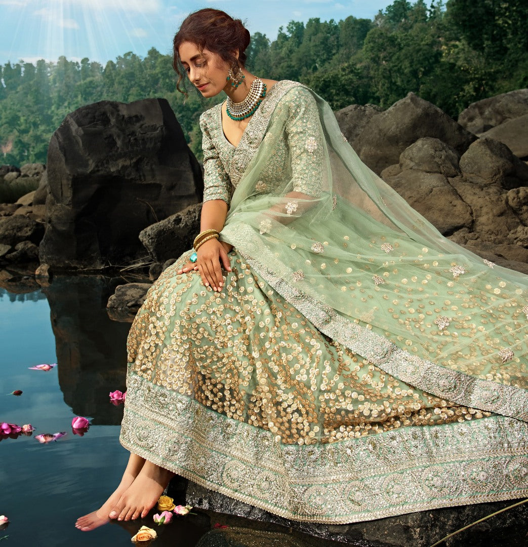 Pista green soft net sequence work bridal lehenga choli