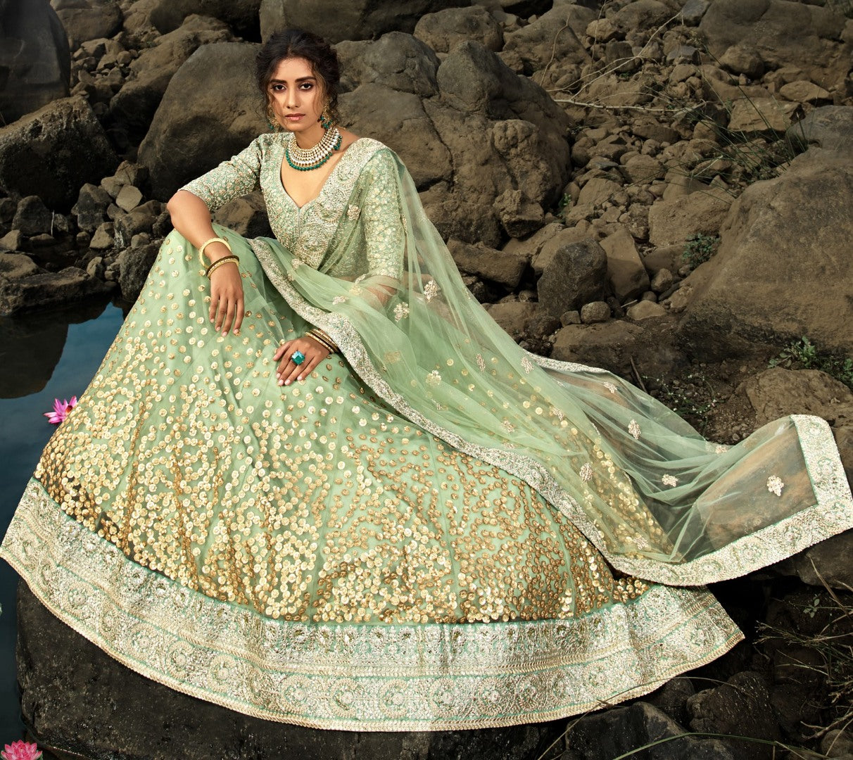 Pista green soft net sequence work bridal lehenga choli