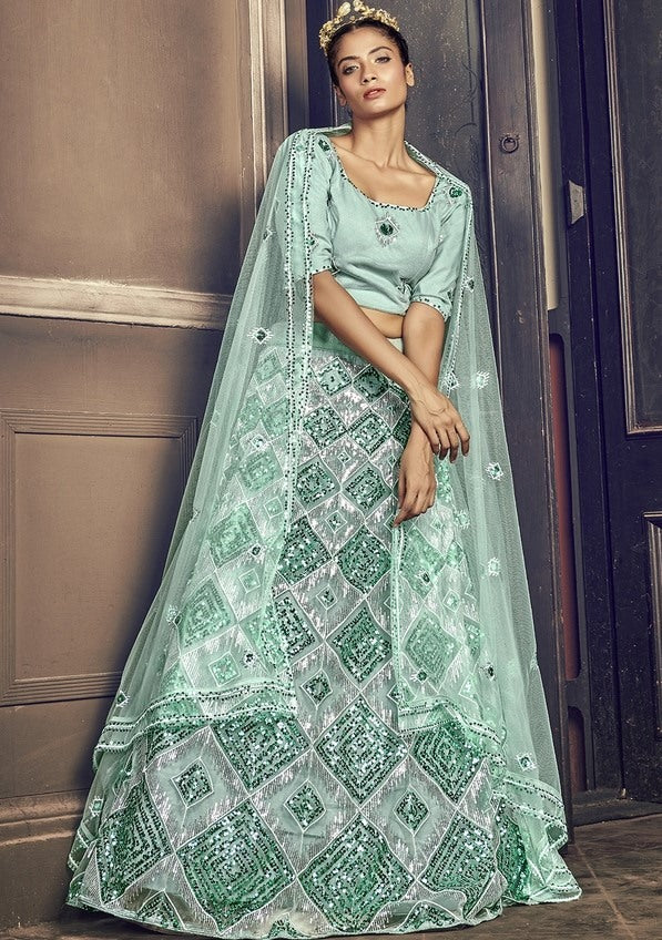 Sea green net sequence embroidered work party wear lehenga choli